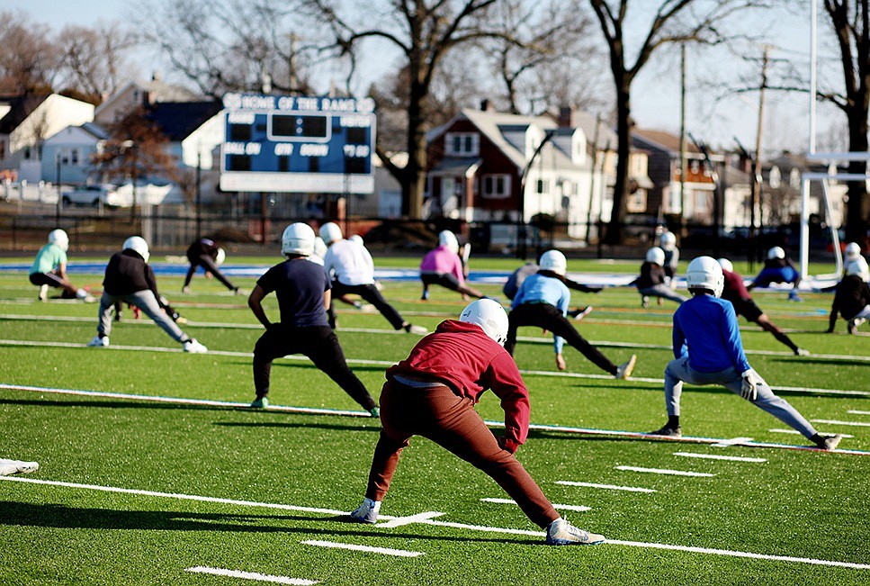 New season, new team, new field, new coach as the grid Rams practice for March Madness 