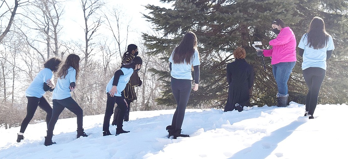 Filming in February makes the landscape appropriately snowy for a “Frozen, Jr.” show. While on the hunt to find Elsa and Anna after they’ve run away, Hans and the Duke of Weselton get caught in a magical blizzard, portrayed by the theater ensemble in blue outfits.