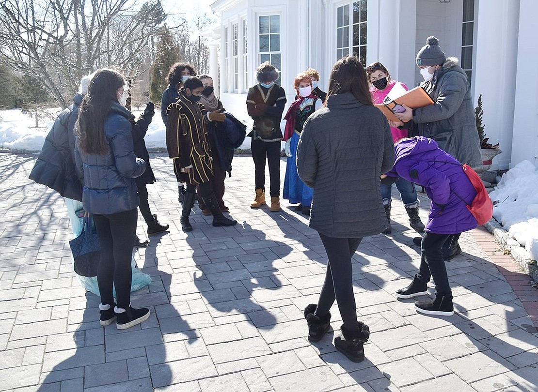 Masked up and circled around for a cast meeting, students in the Blind Brook Middle School Musical Program replaced the indoor stage for Crawford Mansion and Park as a shooting location to produce “Frozen, Jr.” in a COVID-friendly environment.