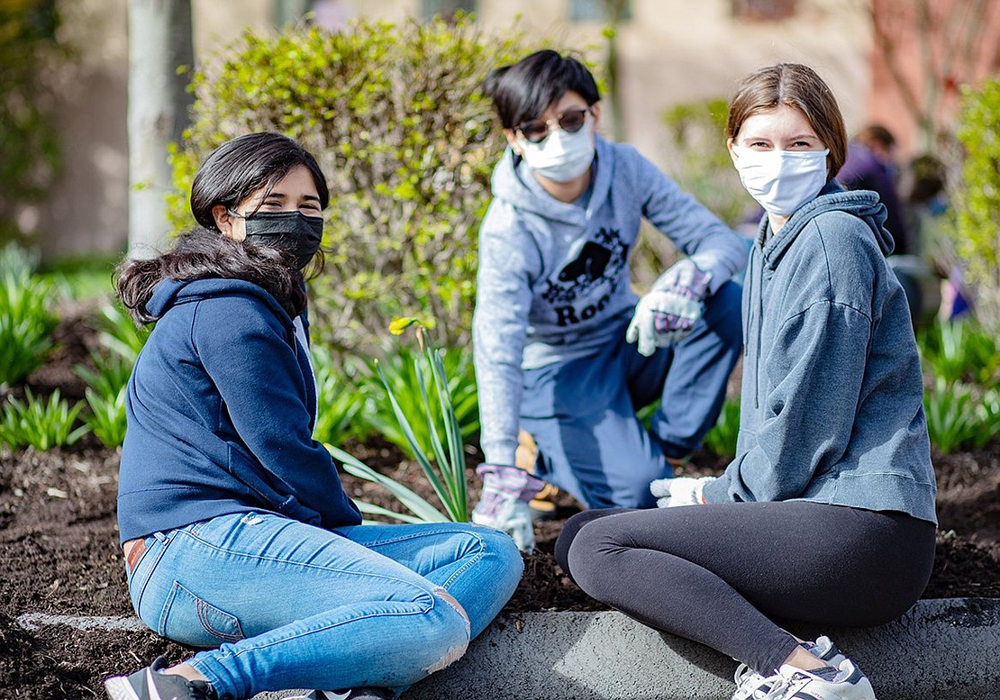 It wasn’t just adults and their obliging children who attended. Zoeya Suhail (left), Austin Lu and Victoria Babiuk, all Blind Brook High School freshmen, came out in support to make the butterfly garden at Rye Brook Village Hall a reality.