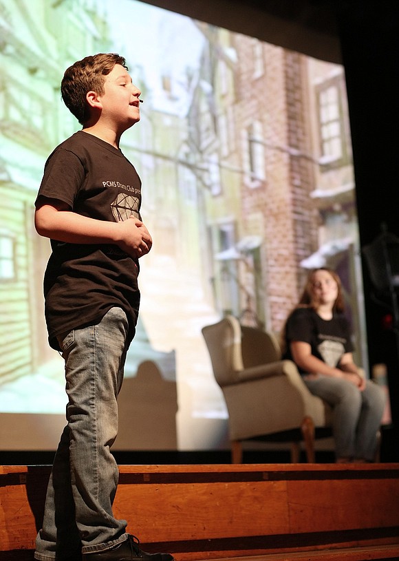 Sixth-grader Quinn Borzoni and eighth-grader Catherine Calloway perform one of the few duets in the show, “I’d Do Anything” from “Oliver,” where Borzoni vies for Calloway’s affection, stating he would do anything for it—from traveling to Timbuktu to catching a kangaroo.