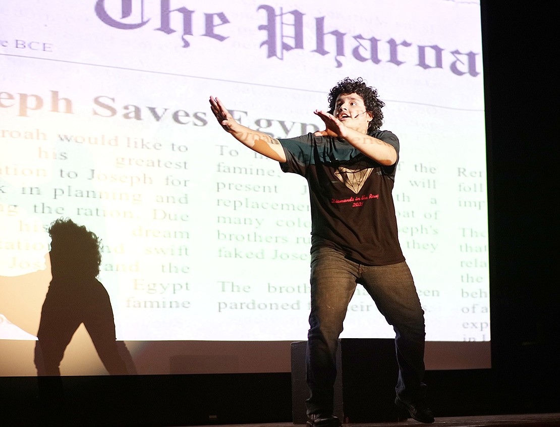 Making wide gestures, seventh-grader Jordan Rivera works the stage during his solo act, “Any Dream Will Do” from “Joseph and the Amazing Technicolor Dreamcoat.”