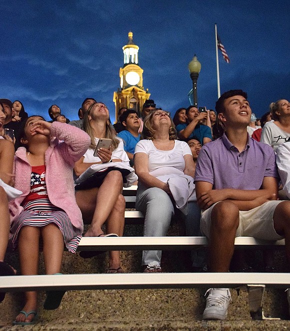 With the Port Chester High School clocktower in the background, spectators look up to see the magnificent incendiary display over the football field. It was sponsored by Neri’s Bakery, the Village of Port Chester, Village of Rye Brook and Town of Rye.