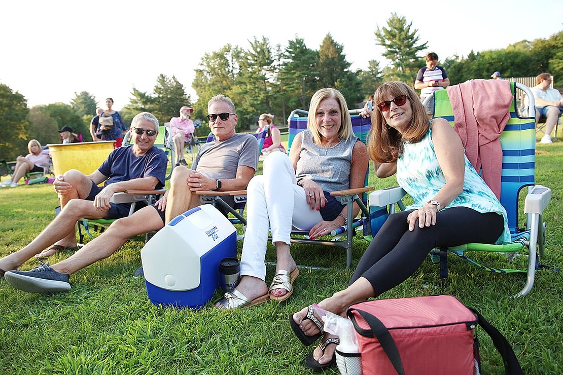 Rye Brook residents Amy Silver (left), Ellen Chasanoff and their spouses Scott Chasanoff and Paul Silver came out on a double date to see the live concert. 