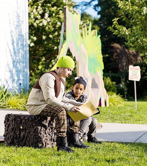 Christopher Cilauro of Port Chester as Shrek has a serious conversation with sidekick Connor McCreath of Rye Brook as Donkey in the Port Chester Council for the Arts production of “Shrek the Musical Jr.” performed on the lawn at Crawford Park on July 29 and 30. It featured area children from 7 to 14 years old who started rehearsing for the show on July 5.