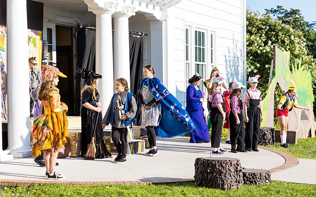 One of Lord Farquaad’s guards, Natalie Budde of Harrison, leads the fairytale creatures to their new home in the swamp. At far right, Lexi Budde of Harrison as Pinocchio sings “The Story of My Life.”