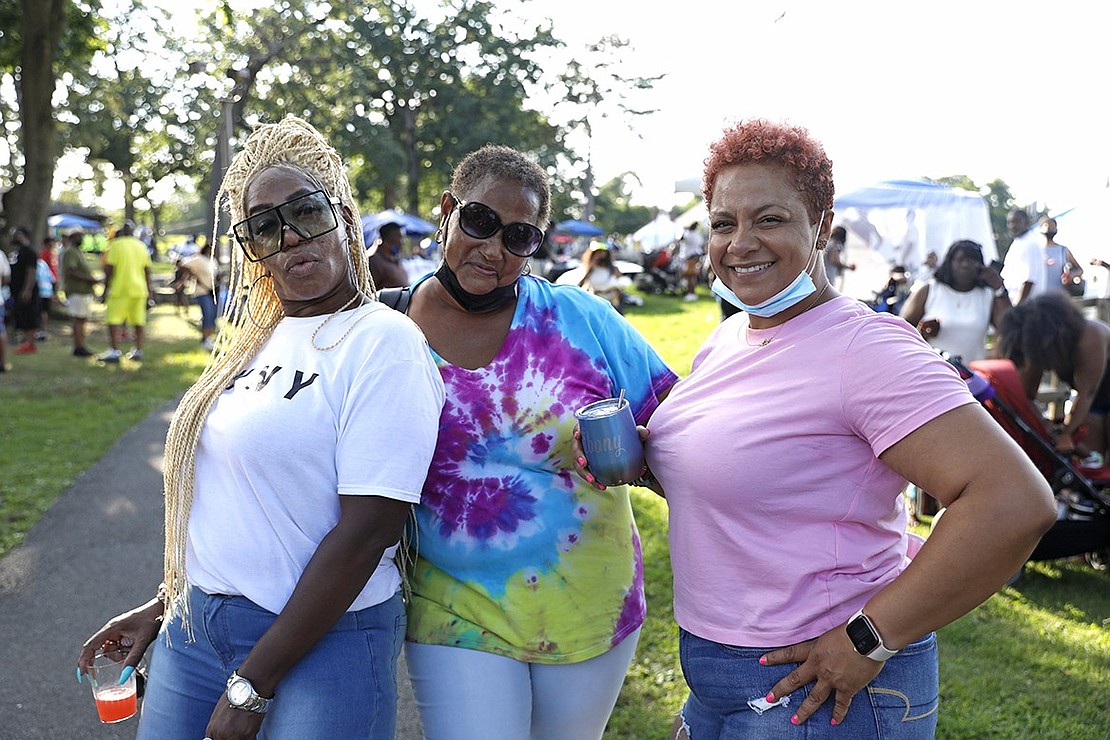 Stamford, Conn. resident Mary A. Herring (left), Purdy Avenue resident Janet Cooper and Grace Church Street resident Ebony Ramos have fun in the park.