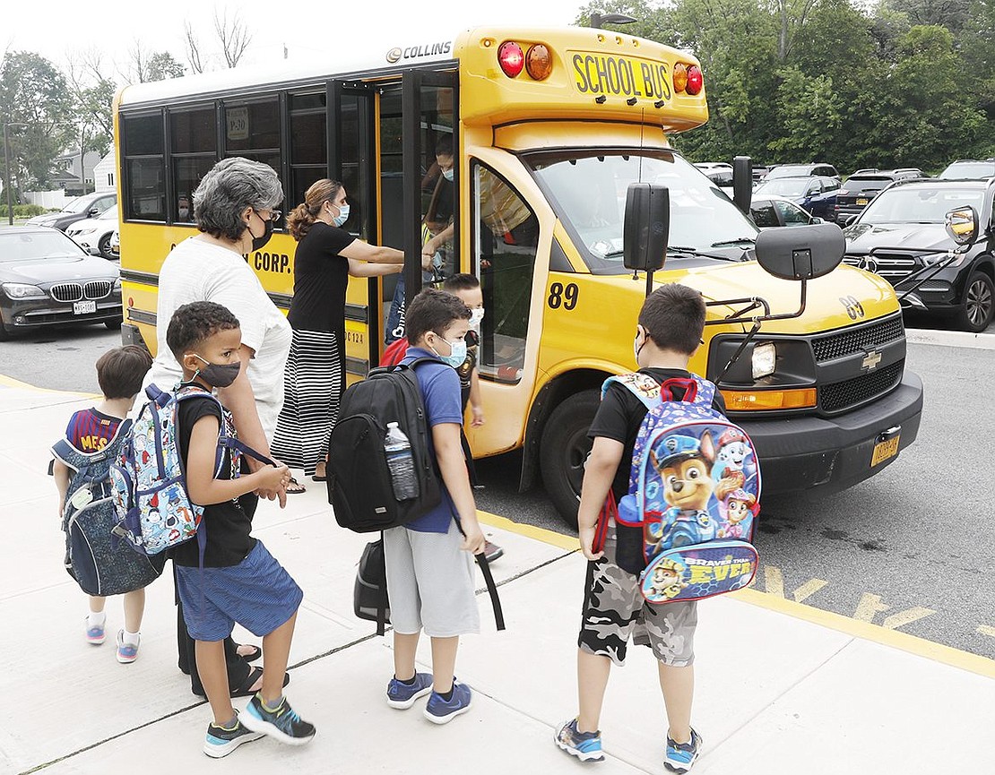 King Street School students get off the bus and patiently wait for their peers on the morning of Wednesday, Sept. 15.