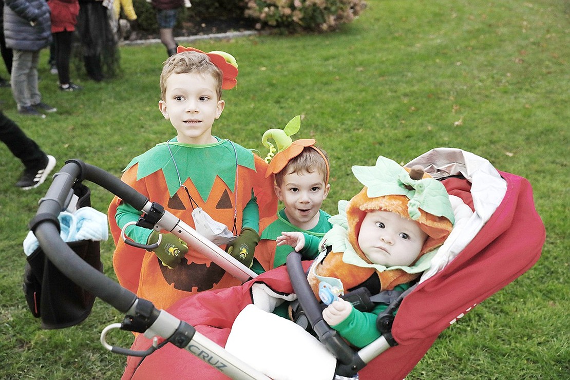 King Street Elementary School student Elliot Franco (left) and his brothers 2-year-old Andrew and 7-month-old Oliver dress as a pumpkin patch together.