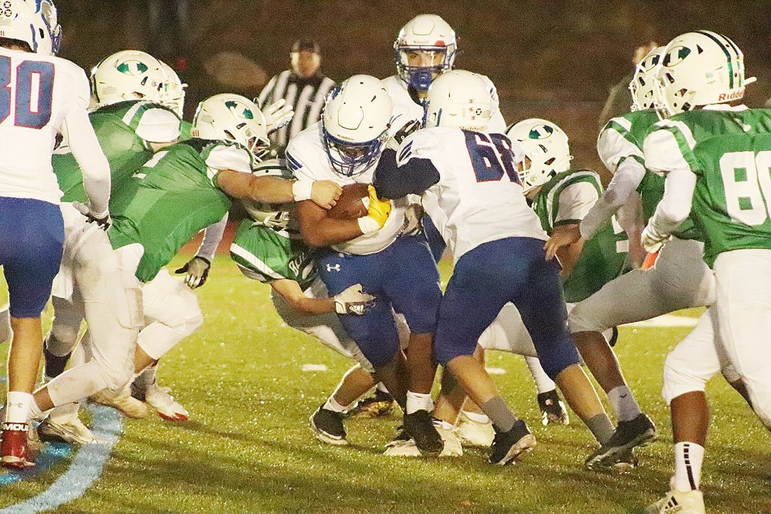 Trojans’ inspiring football season ends with 15-6 loss to Irvington 