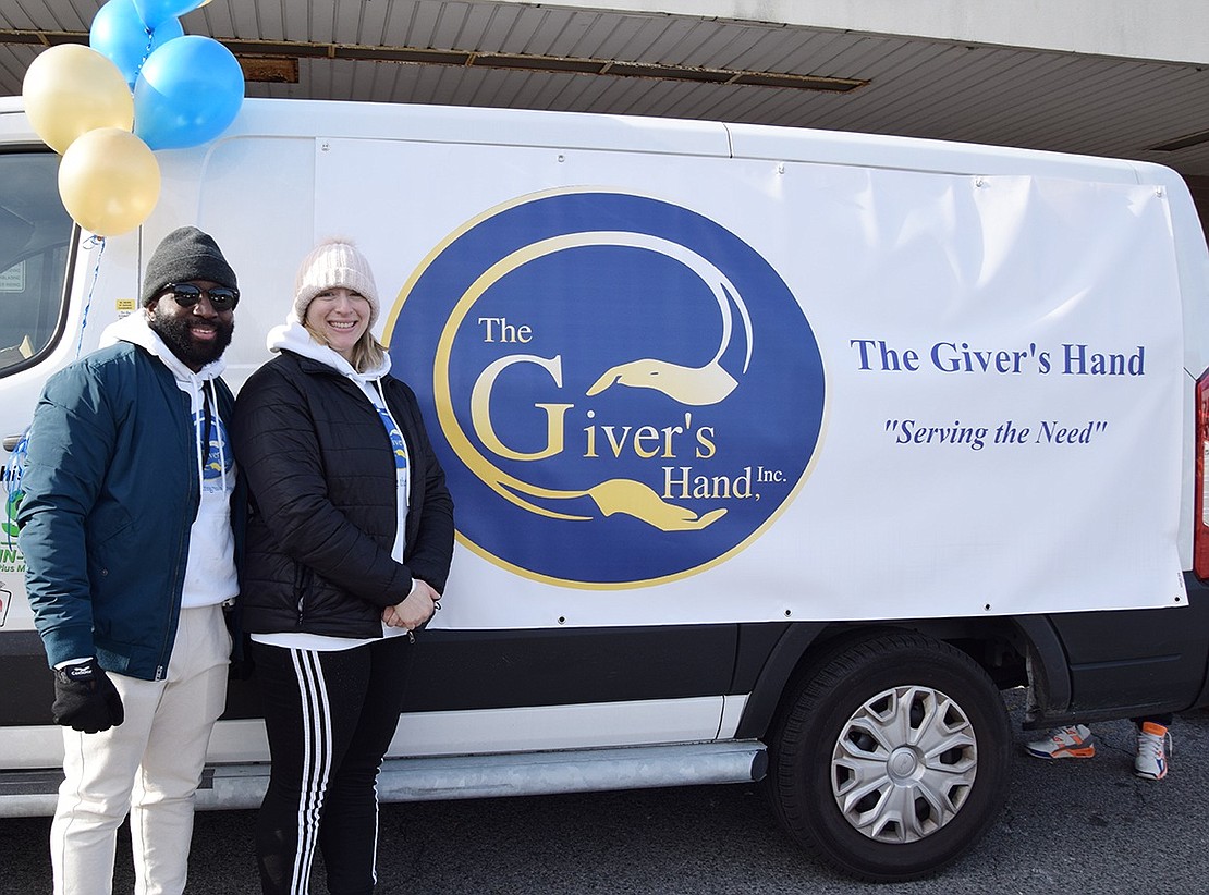 Kate Knowles Howard, who grew up in Port Chester, and her husband Kayode Howard, originally from Mt. Vernon, founded The Giver’s Hand. During the pandemic, they started to see the need in the community with people out of work and organized this Thanksgiving-themed distribution. While last year it was a drive-by giveaway, this year people lined up on the sidewalk. The Howards, who now live in Stamford, plan to make it an annual event.