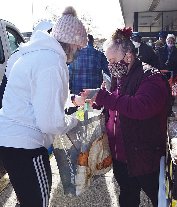 Lynn Luzzi of Quintard Drive was among the first in line at the turkey giveaway.