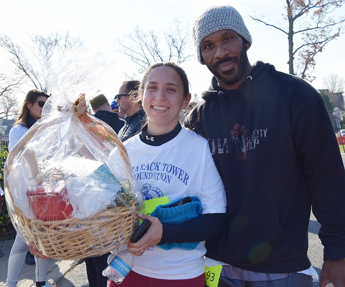 Port Chester High School graduate Victoria Wilson and her husband Phabion won the gift basket for coming the farthest to take part in the Turkey Trot. They traveled from Mableton, Ga. to spend Thanksgiving with her family in Port Chester.