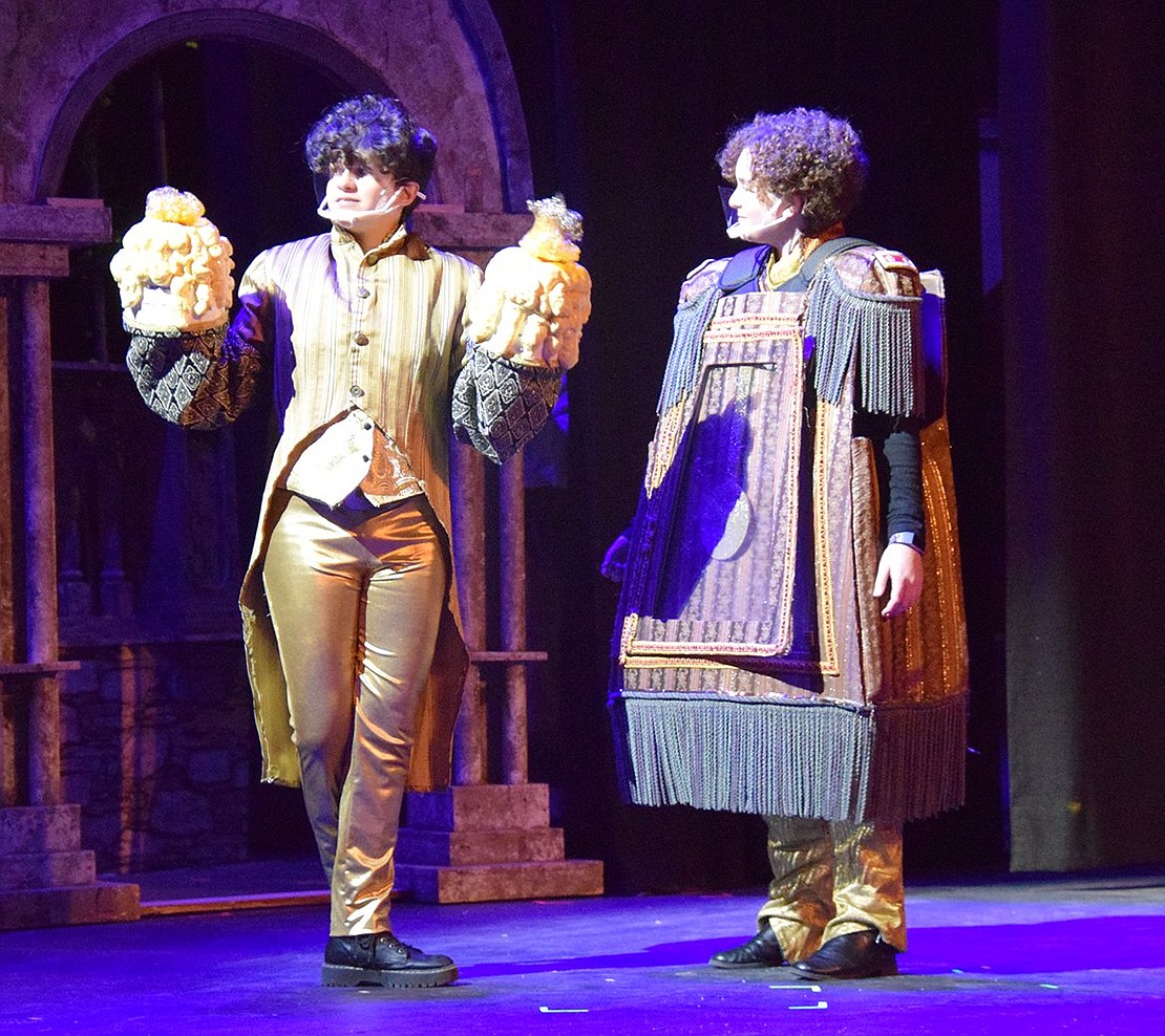 When Belle makes her way into the castle, Lumiere and Cogsworth (played by Cassandra Brunetti and Livia Sherman) start glorifying the idea that she may be the key to breaking the curse.