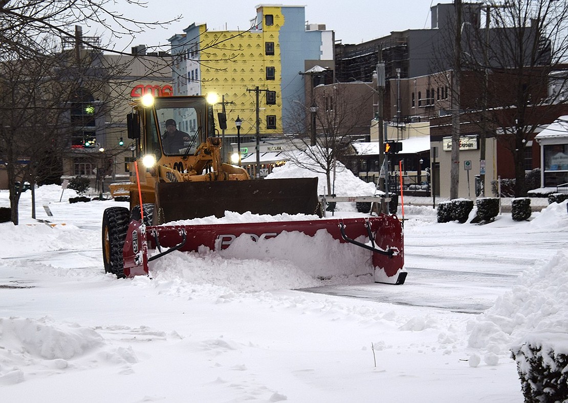 A plow clears the marina parking lot off Abendroth Avenue during the late afternoon last Saturday, Jan. 29, after the second major snowstorm of the season had dropped about seven inches of precipitation in Port Chester. 