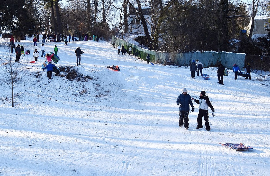 Every hill, both steep and gradual, on both sides of Crawford Park was covered with tubes, sleds, saucers and kids of all ages on Sunday, Jan. 30, the bright, sunny day after the snowstorm.