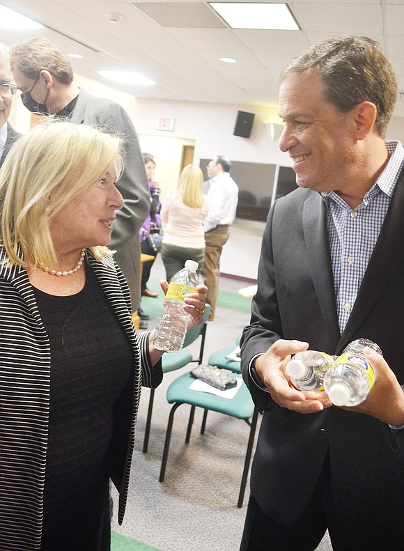 Rye Brook’s last two mayors share a moment during the reception at Village Hall before Paul Rosenberg’s last meeting and recognition ceremony on Tuesday, Mar. 22. Joan Feinstein, who became Rosenberg’s mentor and he like her younger brother, have become fast friends. Feinstein emceed Rosenberg’s recognition ceremony.