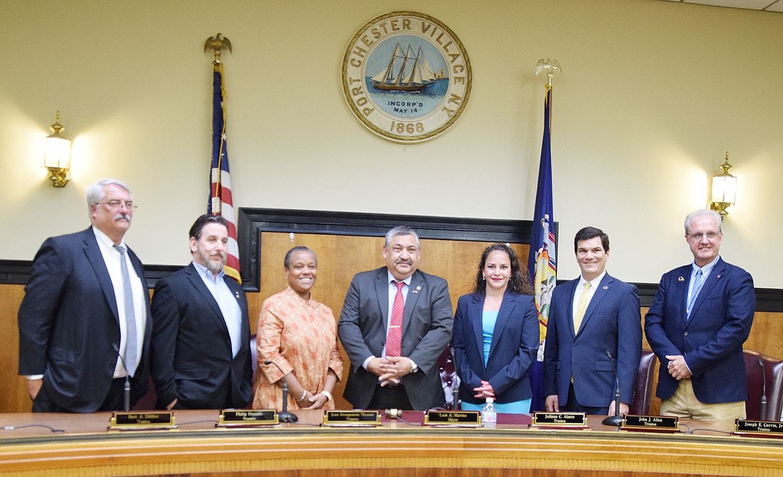 The newly reconstituted Port Chester Board of Trustees including the six new or re-elected trustees after their swearing in Tuesday night, Apr. 6 in the Rye Town Courtroom at 350 North Main St. They are, from left, Trustees Bart Didden, Phil Dorazio, Joan Grangenois-Thomas, Mayor Luis Marino, Trustees Juliana Alzate, John Allen and Joe Carvin. After a year with only six members, the board now has a full complement of seven, four of whom are brand new.