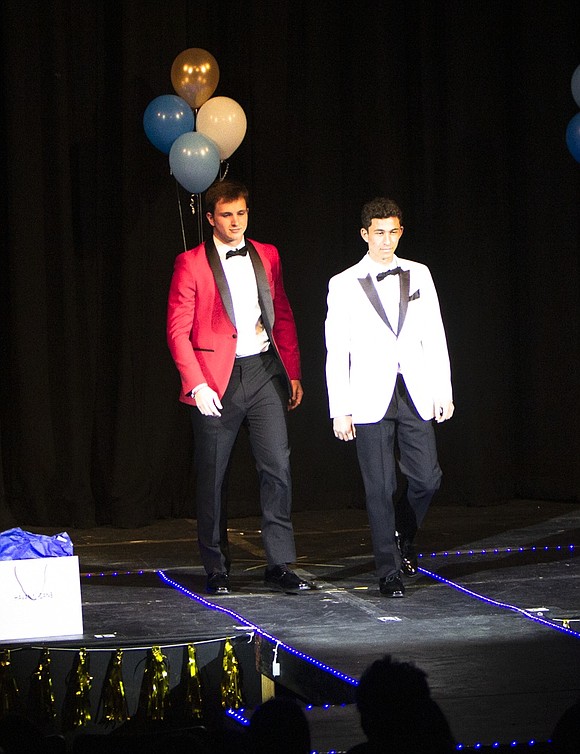 Seniors Mark Short and Matt Shaw showcase tuxedos from Ridge Squire on Bowman Avenue in Port Chester.