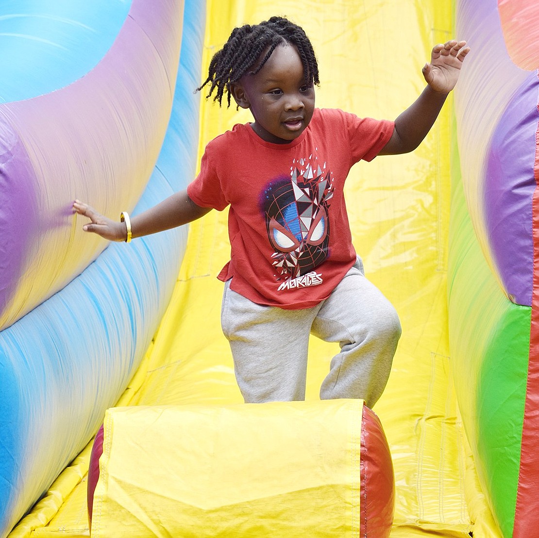 After bouncing down the giant inflatable slide, 4-year-old Greenwich, Conn., resident Joshua Lester is eager to get back in line for more fun.