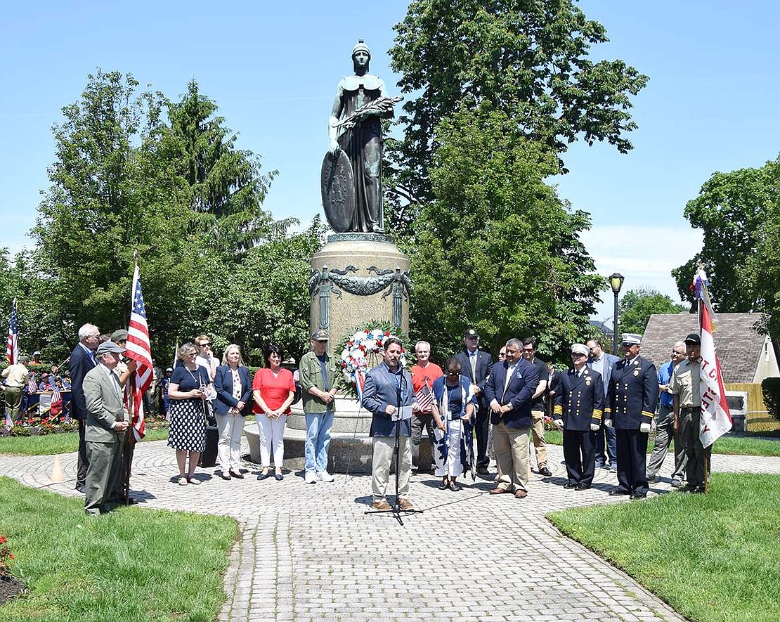 Port Chester Village Trustee Phil Dorazio, who emceed the Memorial Day ceremony at Veterans’ Memorial Park on North Regent Street on Monday, May 30, stands before a slew of local politicians and discusses his pride in serving the Village during times of reflection.