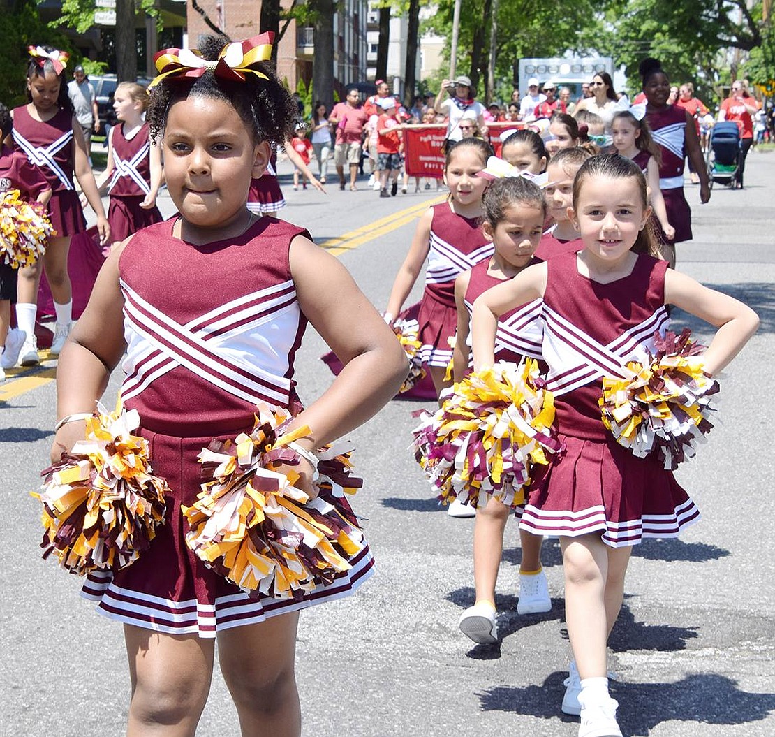 There’s no stopping King Street School first-grader Annabella Sanchez as she proudly leads her fellow cheerleaders through the Memorial Day parade.