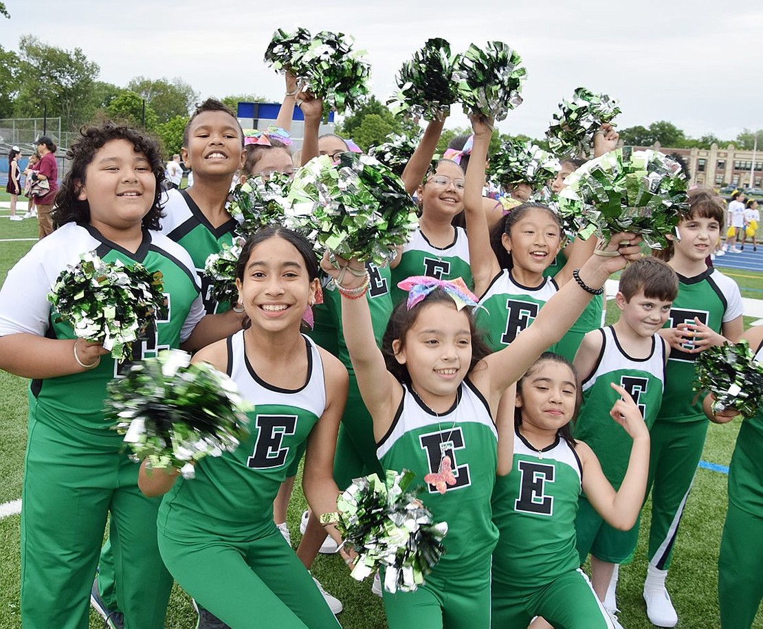 Members of the Edison School spirit squad show their enthusiasm before the show begins.