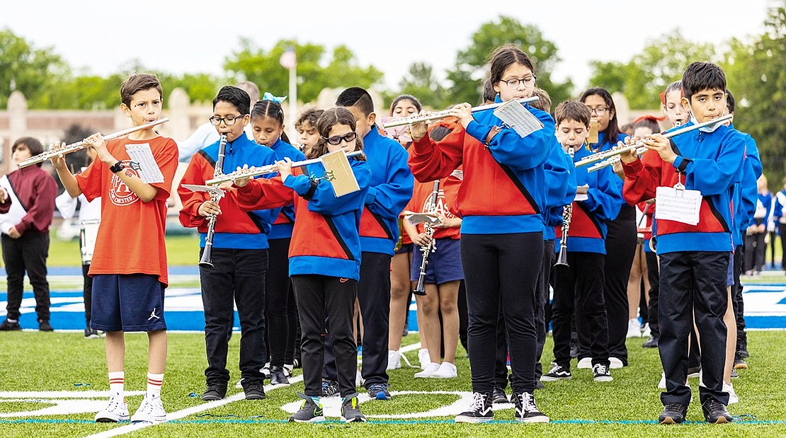 The Park Avenue School portion of the All-Elementary Band plays a melody for the crowd.