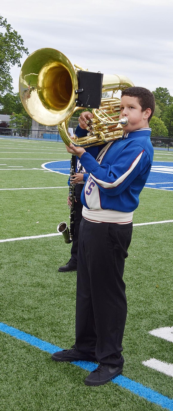 Seventh grader Emiliano Reyes plays tuba with the 7th and 8th grade band.