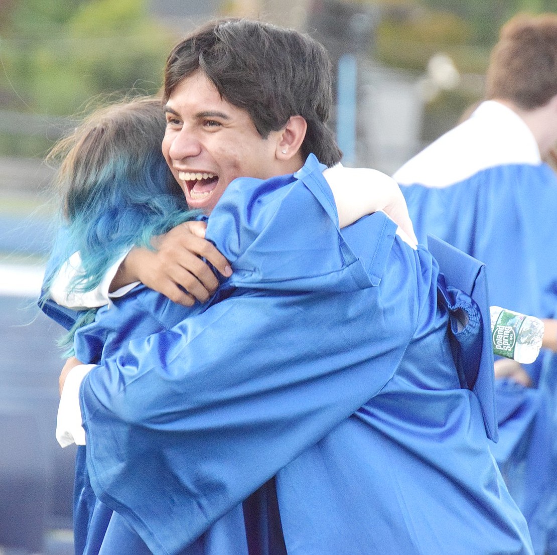 As soon as the Port Chester High School Class of 2022 commencement ceremony concludes, Darian Sanchez embraces a classmate with an expression of pure joy plastered across his face.