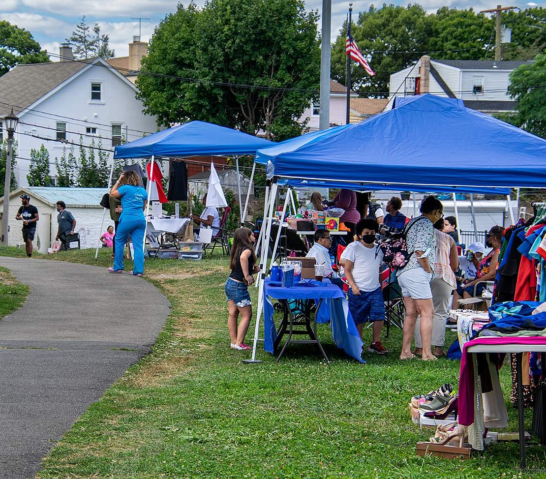 Pop up tents line the path at Columbus Park as vendors from all over Westchester peddle their wares to Unity Day attendees. Some sold clothing and jewelry while others sold Tupperware and other name-brand items.