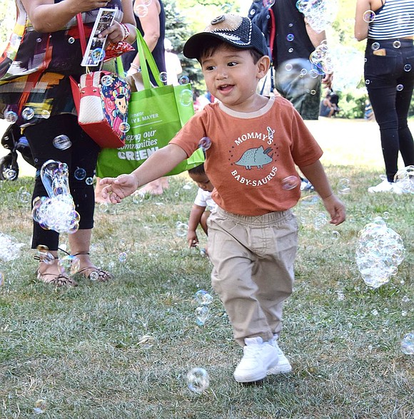 There were ample children’s attractions set up across Lyon Park on Port Chester Day, but Westchester Avenue resident Javier Trujillo, 2, is all about dancing with the floating suds provided by the Bubble Bus.