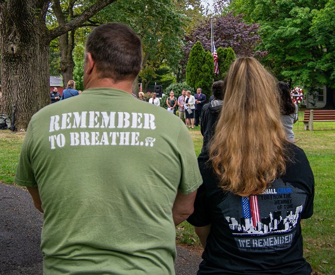 Phil (left) and Kim Cambriello, who live on North Ridge Street in Rye Brook, wear shirts that reference the military and the tragedy 21 years ago.