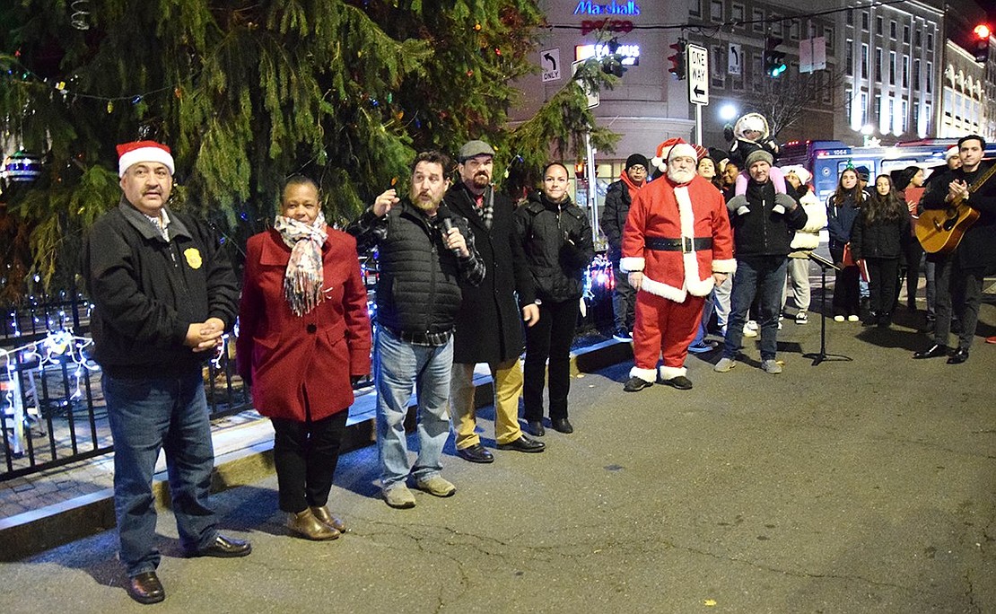 Mayor Luis Marino, Port Chester Trustees Joan Grangenois-Thomas, Phil Dorazio, John Allen and Juliana Alzate welcome attendees to the lighting of the Christmas tree in Liberty Square on Thursday, Dec. 1. Santa Claus watches over the entire event. Dorazio dubbed it “the best tree in 52 years” and Marino said: “I have never seen anything like that.”