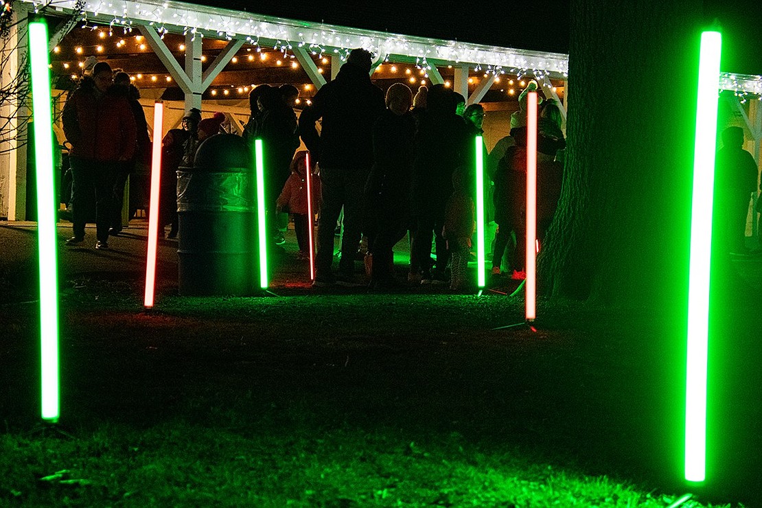 Red and green light poles signify the start of the line for the mini train, which carried passengers in a loop around the Crawford Mansion Community Center parking lot.