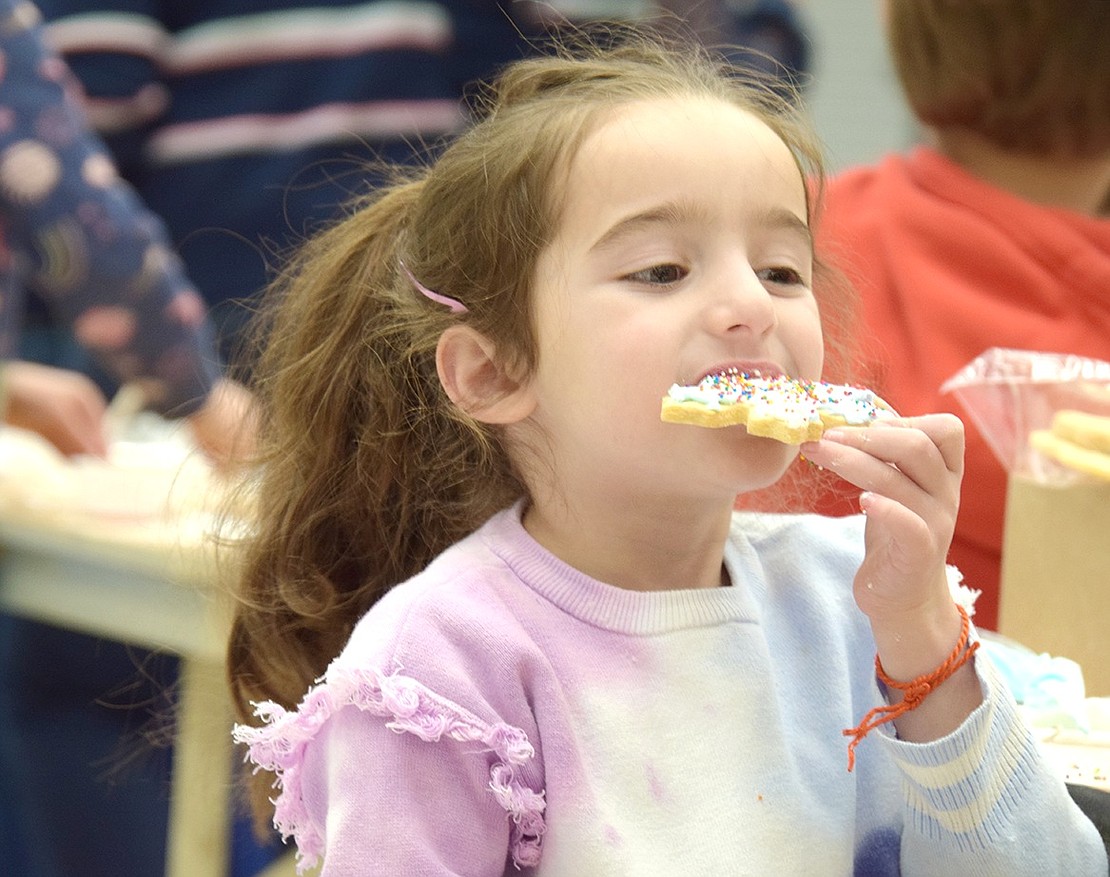 The best part about decorating cookies is tasting the final product, as first-grader Gabrielle Koyfman can speak to—when she’s done with her treat!