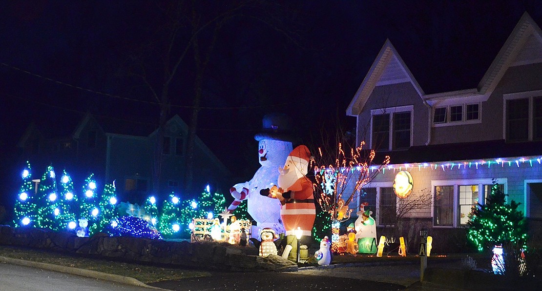 Frosty the Snowman and Santa enjoy a nice chat on the lawn of 25 Lincoln Ave., where oodles of lights and blow-up decorations greet drivers each night. There are snowmen, penguins, a light-up Nativity set, sleighs and even a few New York Giants-themed decorations. The house was added, along with eight others, to a list the Rye Brook Department of Recreation compiled of residences with flashy holiday decorations to encourage community members to tour the Village.