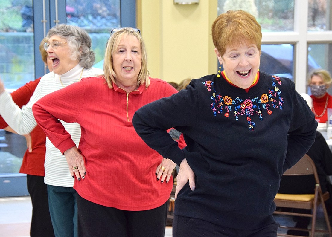 Peggyann Munnick (front), of Port Chester, and Avon Circle resident Denise Borsari have a blast while getting funky and dancing to the “Macarena.”