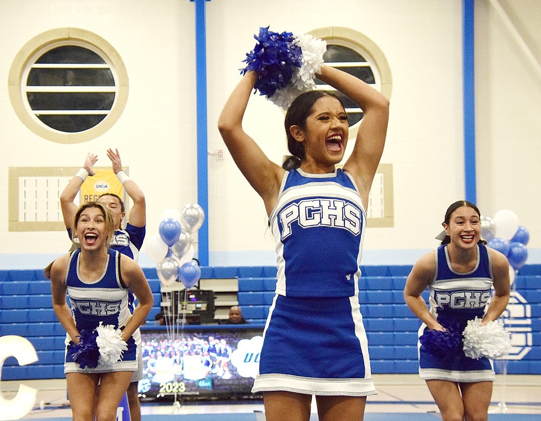 Intense emotions stretch across varsity cheerleaders freshman Melina Morban (left), senior Arlinne Lucero and junior Mayelin Gonzalez’s faces as they perform for a packed audience in the high school gym on Monday, Feb. 6. Port Chester Schools cheer teams showcased their talents during a Sendoff to Nationals exhibition celebrating the varsity and junior varsity teams’ trip to the Universal Cheerleaders Association Nationals in Orlando, Fla. this weekend.